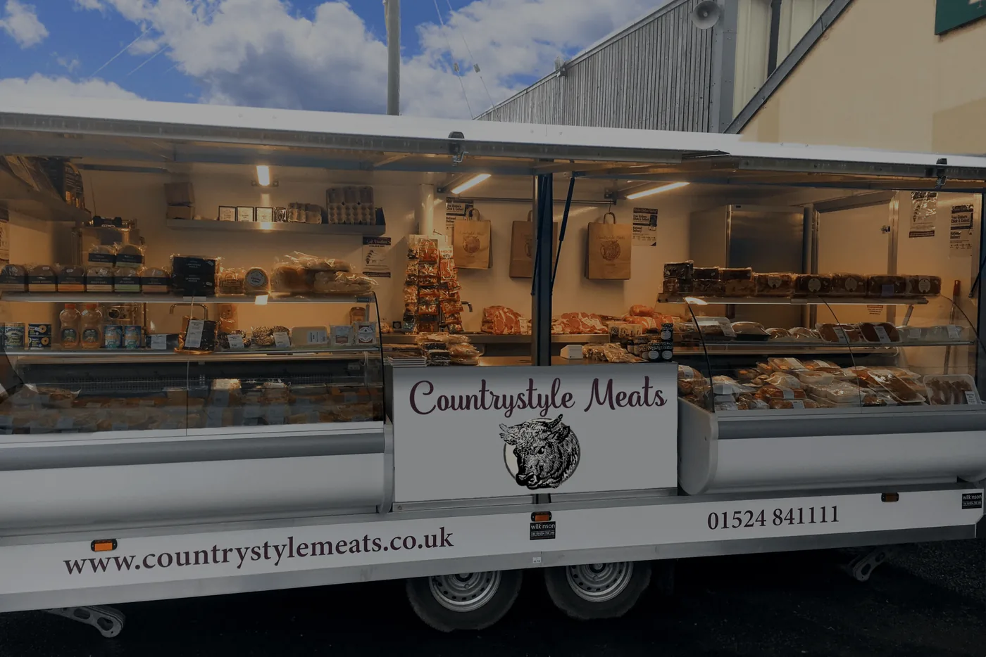 A finished Four Meat Carvery plate at Countrystyle Kitchen with sliced beef, roast potatoes, vegetables and Yorkshire puddings